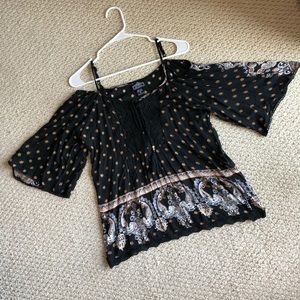 Black printed top with bell sleeves